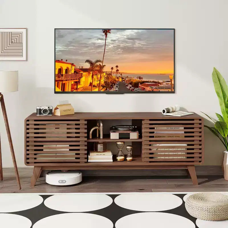 TV Stand with Sliding Doors, Adjustable Shelves & Rubber Wood Legs for TVs up to 65"